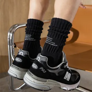 Japanese workwear style black towel bottom sports socks, American chunky stacked crew socks.