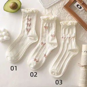 White ruffled mid-tube socks with sweet pink bow embroidery, cute college style daily wear.