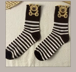 Cute teddy bear crew socks for women, winter warm black and white stripes knit hosiery.
