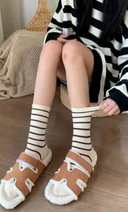 Casual striped mid-calf socks for women, soft knit daily wear fashion accessory and comfort.