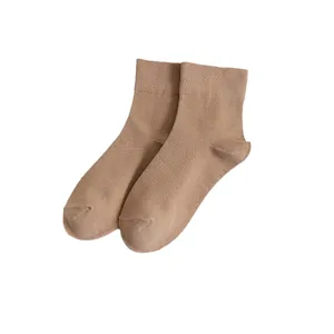 Comfortable solid color short crew socks for women, perfect for daily wear and spring autumn seasons.