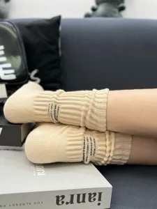 Japanese vintage thick ribbed towel-bottom stacked socks detail view, cozy casual wear.