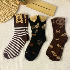 Cute fluffy bear mid-calf socks for women, stylish autumn and winter knit hosiery main view.