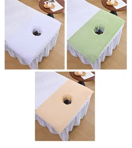Thick coral fleece massage bed face hole cover detail view, soft and absorbent fabric.