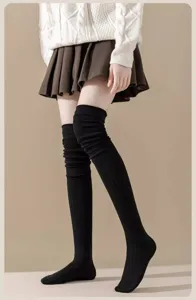 Black ribbed over-the-knee socks, detail shot showing texture and fit for women daily wear.