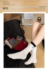 Stylish autumn winter mid tube stack socks with contrast color and cute embroidery details.