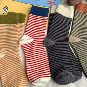 Women's casual mid-tube striped socks with contrast color cuffs, cozy cotton daily wear.