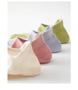 Detail view of breathable summer women boat socks in soft pastel colors, cotton blend.