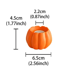 Resin pumpkin candle holder detail view, Halloween harvest tabletop home decor and ornament.