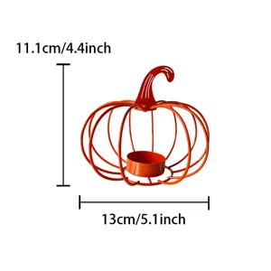 Orange metal pumpkin candle holder detail view, iron art decorative harvest festival prop.