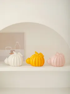 Ceramic pumpkin tabletop ornament set, perfect for modern home, living room, and autumn decor.