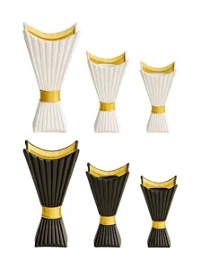 Elegant Arabic incense burner set, black and white resin candle holders with gold accents.