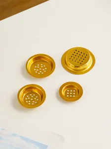 Golden metal hollow incense burner pads details, exquisite hardware accessory set.