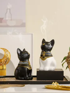Egyptian cat incense burner detail showing the exquisite design and smoking effect.