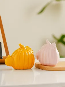 Ceramic pumpkin desktop decor ornament modern aesthetic home living room decoration detail shot.