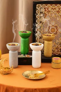 Bruciatore di incenso in resina da scrivania arabo del Medio Oriente con finitura glitter.
