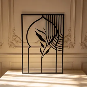 Black metal wall art with elegant arch and leaf silhouette for modern home decor view