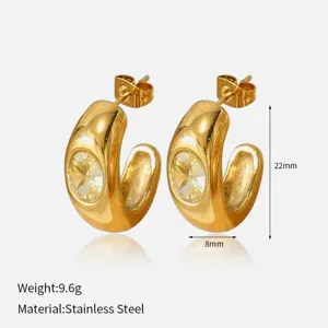 Pendientes de aro en forma de C de acero inoxidable dorado con cristal amarillo brillante.