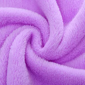 Soft purple coral fleece bath towel, thick absorbent face towel for home and hotel use.