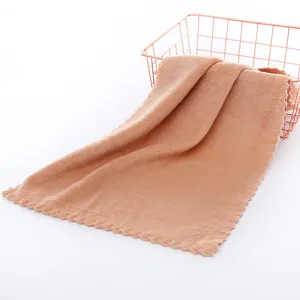 Soft coral fleece face towel for daily home use with wave edge design and storage basket
