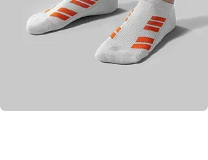 White athletic ankle socks with orange stripes for men and women running sportswear