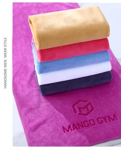 Detailed view of soft microfiber towels in multi-colors, highly absorbent fabric texture.
