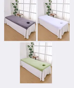 Detailed view of thick microfiber massage table cover with face hole in multiple colors.