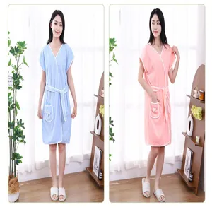Coral fleece wearable bath towel dress for women, soft absorbent spa wrap robe with pockets.