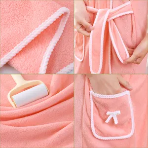 Pink coral fleece wearable bath towel detail, soft absorbent bath skirt with bow and pocket.