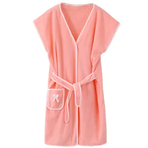 Soft pink coral fleece wearable bath towel bathrobe for women comfortable absorbent spa dress.