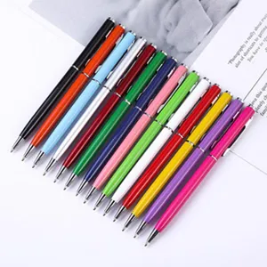 Detailed close-up shot of colorful metal push ballpoint pens for smooth daily office writing.