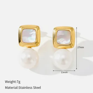 Detailed close-up of square stainless steel pearl drop earrings showing intricate craftsmanship and texture.