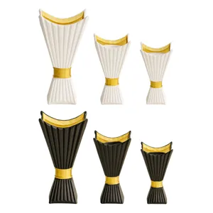 Middle Eastern style horned chalice candle holder set, black and white resin home decor.