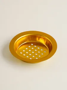Gold metal censer tray mesh insert, perforated hardware accessory closeup detail view.