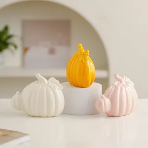 Modern ceramic pumpkin decor set, minimalist tabletop ornaments for living room and office.