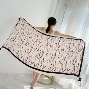 Elegant women long silk scarf with vintage chain belt print, ideal for daily commuting style.