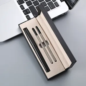 Premium business gift pen set with black rollerball pen, two refills and elegant leather texture box.