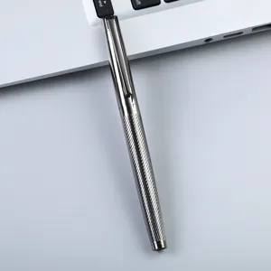 High-end engraved metal rollerball signature pen with textured barrel and sleek metal clip for office use.