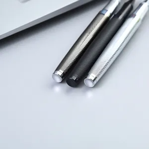 High-end engraved metal signature rollerball pen set with sophisticated knurled design.