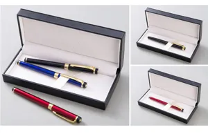 Detailed view of the metal gift pen set with black, blue, and red options in a box.