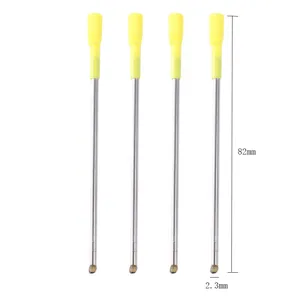 Detail view of 82mm metal diamond pen replacement refills, featuring yellow tops and fine tips.