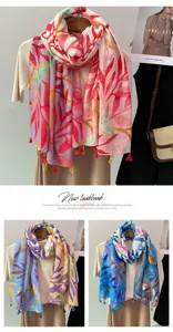 Floral print tassel scarf detail showing lightweight linen texture and vibrant colors.