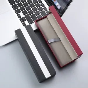 Caja de regalo rectangular para bolígrafo con cinta, elegante empaque para pequeños obsequios.