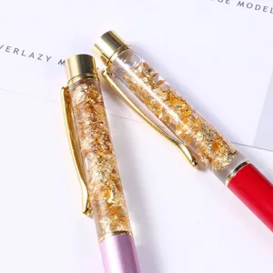 Metal oil-injected gold foil ballpoint pen with clear barrel and custom logo design.