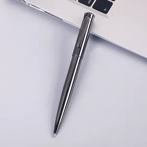 Sleek business metal ballpoint pen detail view, executive gunmetal finish writing tool for office.