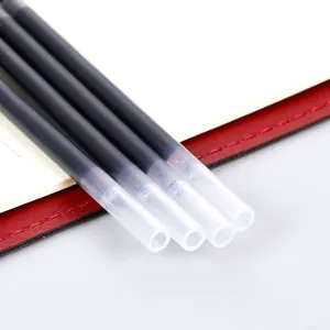 Close-up of four black gel ink pen refills with transparent tubes for smooth writing.