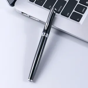Black metal business signature pen with silver accents on clean desk background for daily office use.