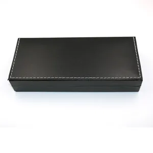 Elegante scatola regalo per penne in pelle nera con cuciture bianche per cancelleria.