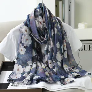 Blue floral silk scarf close up, elegant draping detail, versatile fashion accessory