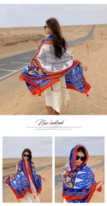 Detailed view of ethnic style color-block shawl in desert scene with vibrant prints.